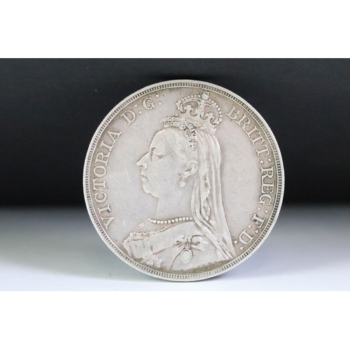 67 - A British Queen Victoria 1892 silver full crown coin together with a King George IIII 1821 example.