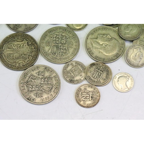 72 - A collection of British pre 1947 & pre 1920 silver coins to include Queen Victorian examples.