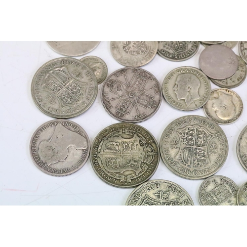 72 - A collection of British pre 1947 & pre 1920 silver coins to include Queen Victorian examples.