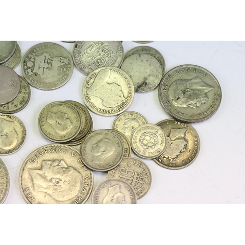 72 - A collection of British pre 1947 & pre 1920 silver coins to include Queen Victorian examples.