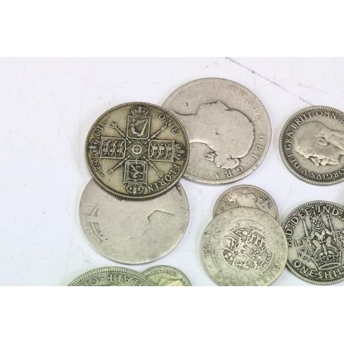 72 - A collection of British pre 1947 & pre 1920 silver coins to include Queen Victorian examples.