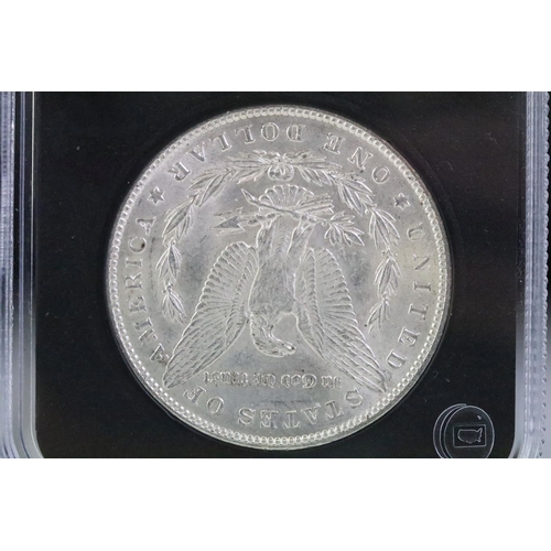 75 - An uncirculated slab mounted 1889 United States Morgan dollar.