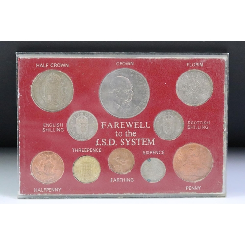 76 - A collection of seven mounted coin sets to include 1967 Coinage of G.B., 1965 EIIR set, Farewell to ... 