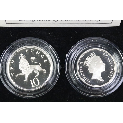 237 - A collection of Royal Mint United Kingdom silver proof coins to include 1988 £1 coin, 1985 £1 coin, ... 