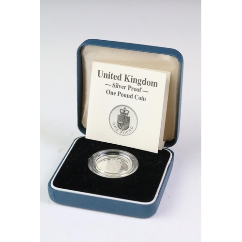 237 - A collection of Royal Mint United Kingdom silver proof coins to include 1988 £1 coin, 1985 £1 coin, ... 