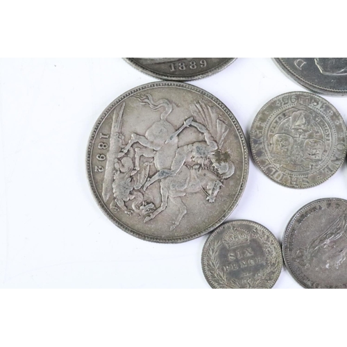 242 - A small collection of pre decimal silver coins to include three Queen Victoria full crown coins toge... 