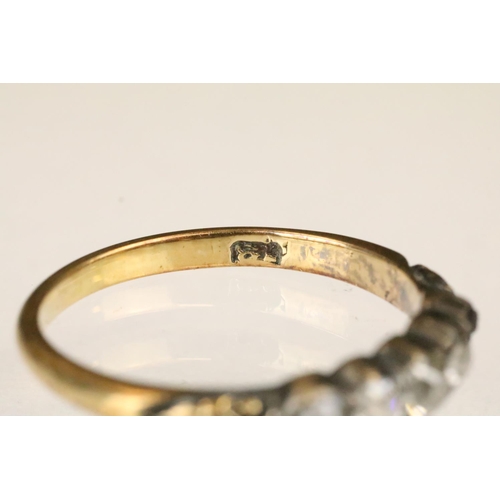 152 - Three gold rings to include a an18ct gold five stone diamond ring (one diamond missing, size M, mark... 