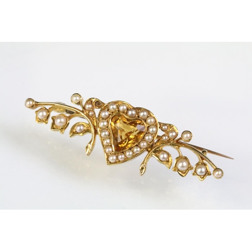 22 - 19th Century Victorian gold, citrine and split pearl heart brooch. The brooch having a mixed cut hea... 