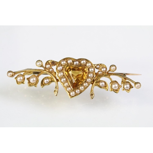 22 - 19th Century Victorian gold, citrine and split pearl heart brooch. The brooch having a mixed cut hea... 