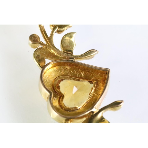 22 - 19th Century Victorian gold, citrine and split pearl heart brooch. The brooch having a mixed cut hea... 