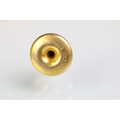 233 - Four yellow metal dress studs and one gold plated example. Yellow metal example one set with a round... 