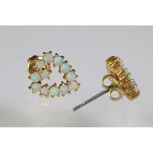 250 - Collection of gold earrings to include a pair of 9ct gold and opal stud earrings (marked 9ct), p air... 