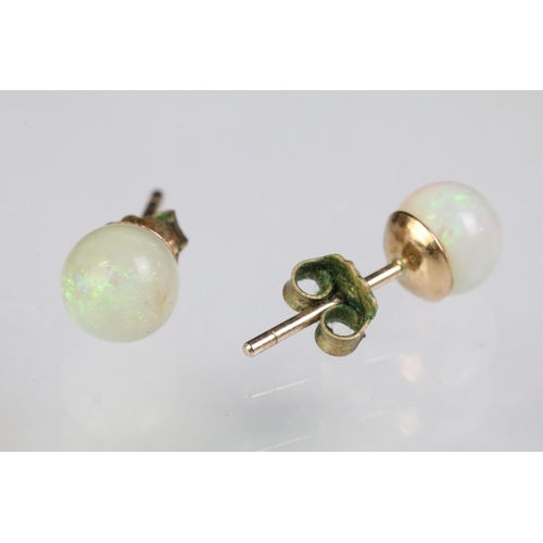 250 - Collection of gold earrings to include a pair of 9ct gold and opal stud earrings (marked 9ct), p air... 