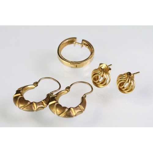 255 - Pair of 18ct gold knot design stud earrings (backs marked 750), a pair of gypsy hoop earrings (unmar... 