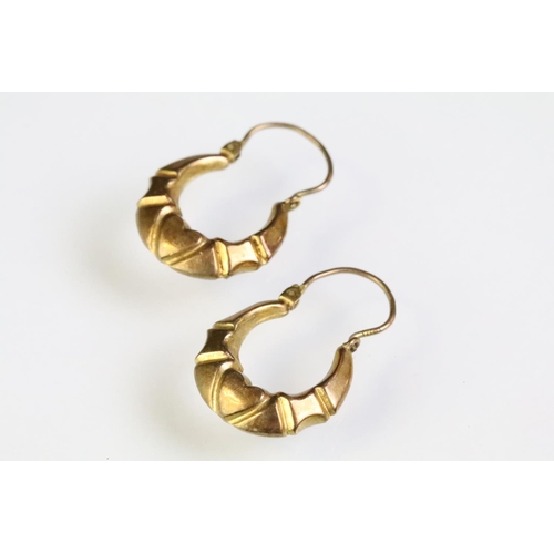 255 - Pair of 18ct gold knot design stud earrings (backs marked 750), a pair of gypsy hoop earrings (unmar... 