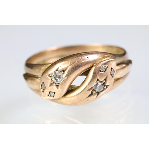 4 - 9ct gold and diamond antique snake ring in the form of two entwined snakes, each with a round single... 