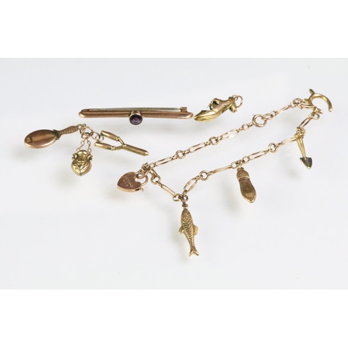 180 - 9ct gold charm bracelet with five charms together with four 9ct charms and a 9ct gold bar brooch set... 