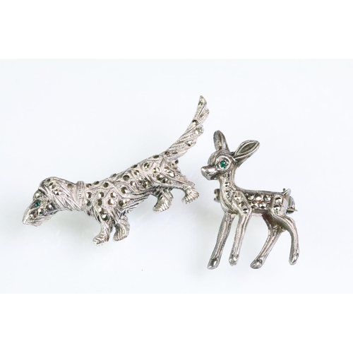 182 - Two Art Deco marcasite set brooches to include a dog brooch with a green stone eye (marked platinin)... 