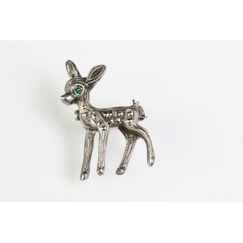 182 - Two Art Deco marcasite set brooches to include a dog brooch with a green stone eye (marked platinin)... 