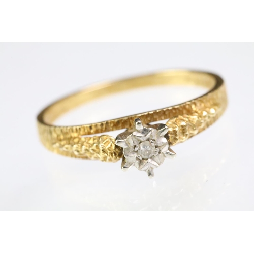 197 - 1970s vintage 18ct gold diamond solitaire ring being illusion set with a single cut diamond on textu... 