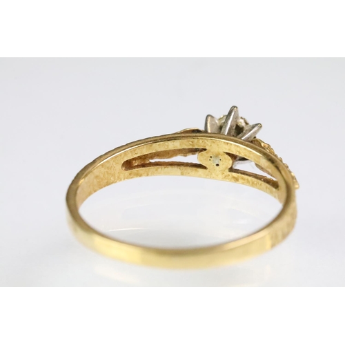 197 - 1970s vintage 18ct gold diamond solitaire ring being illusion set with a single cut diamond on textu... 