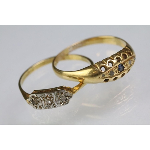 200 - Two 18ct gold rings to include an 18ct gold and platinum diamond set panel ring (marked 28ct & plat,... 