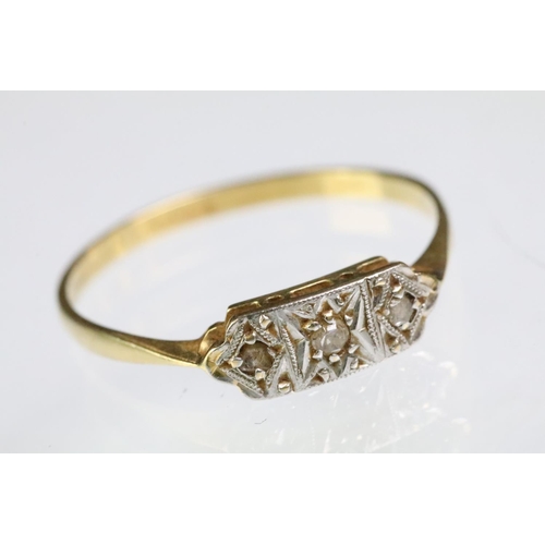 200 - Two 18ct gold rings to include an 18ct gold and platinum diamond set panel ring (marked 28ct & plat,... 