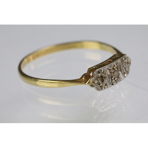 200 - Two 18ct gold rings to include an 18ct gold and platinum diamond set panel ring (marked 28ct & plat,... 