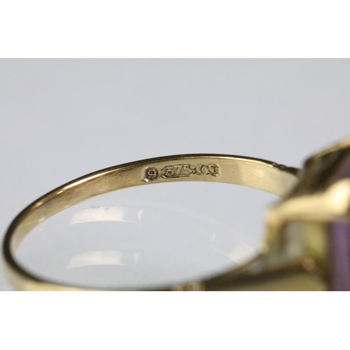 219 - Two hallmarked 9ct gold rings to include a 9ct gold and amethyst mixed cut ring (size P.5) and a whi... 