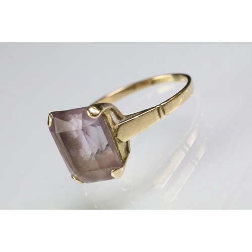 219 - Two hallmarked 9ct gold rings to include a 9ct gold and amethyst mixed cut ring (size P.5) and a whi... 