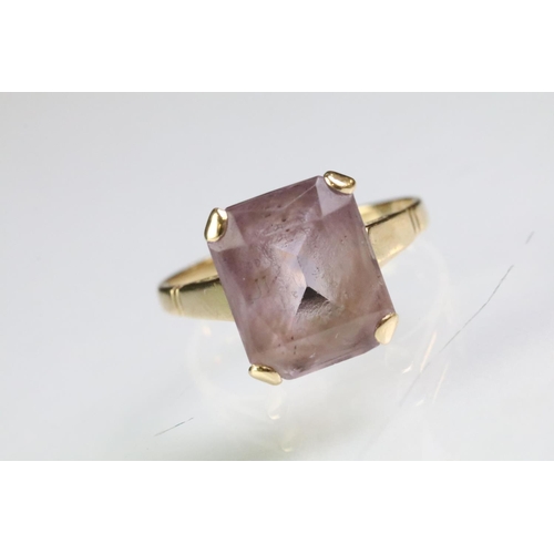 219 - Two hallmarked 9ct gold rings to include a 9ct gold and amethyst mixed cut ring (size P.5) and a whi... 