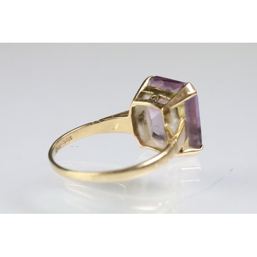 219 - Two hallmarked 9ct gold rings to include a 9ct gold and amethyst mixed cut ring (size P.5) and a whi... 