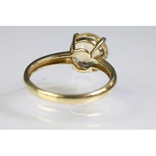 225 - 9ct gold hallmarked citrine solitaire ring being set with a round mixed cut citrine. Hallmarked Birm... 