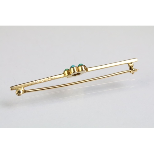 236 - Mid Century 9ct gold and turquoise bar brooch having set with six turquoise cabochons to the centre,... 