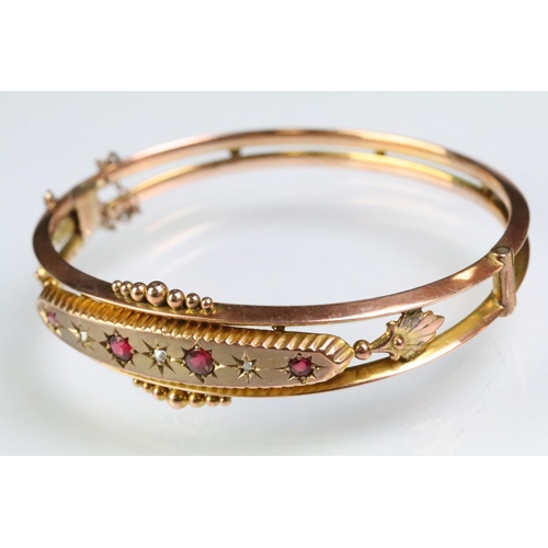 26 - 19th Century Victorian 9ct gold, ruby and diamond hinged bangle bracelet. The bracelet consteucted f... 