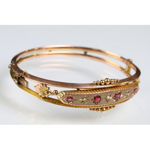 26 - 19th Century Victorian 9ct gold, ruby and diamond hinged bangle bracelet. The bracelet consteucted f... 