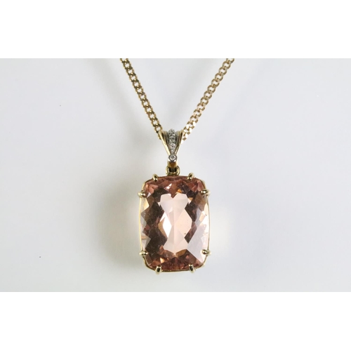 284 - 9ct gold and morganite pendant being set with a large cushion cut morganite with diamond chips to th... 