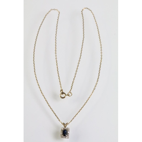 301 - 9ct gold, sapphire and diamond cluster pendant necklace. The pendant being set with a rectangular cu... 