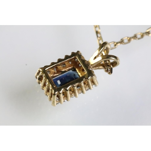 301 - 9ct gold, sapphire and diamond cluster pendant necklace. The pendant being set with a rectangular cu... 