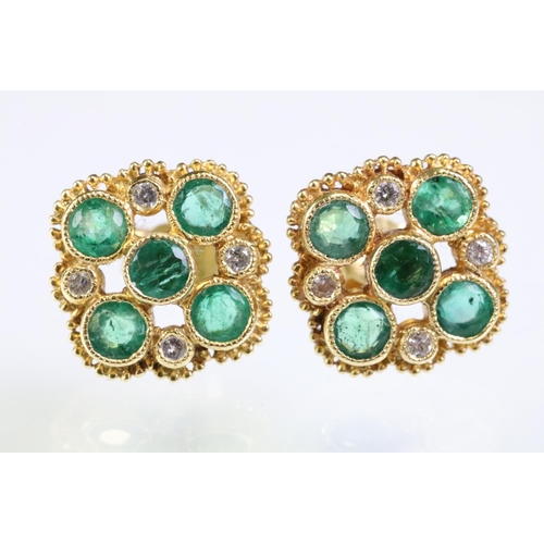 308 - Pair of 18ct gold, emerald and diamond cluster earrings. The earrings set with five round cut emeral... 