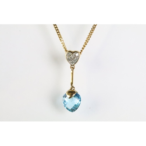 319 - 9ct gold diamond and topaz pendant necklace. The necklace having a briolette cut blue topaz drop sus... 