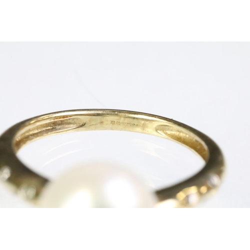 35 - 9ct gold hallmarked, cultured pearl and diamond ring being set with a white pearl to the head with d... 