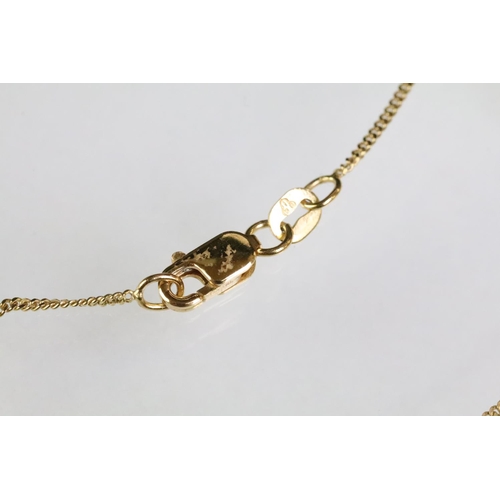 64 - 18ct gold and cultured pearl pendant necklace. The necklace having a fine link chain with lobster cl... 