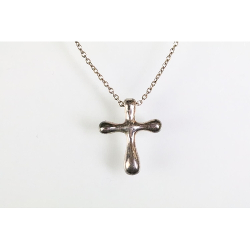 68 - Group of Tiffany & Co silver jewellery to include a modernist silver cross pendant, crucifix pendant... 