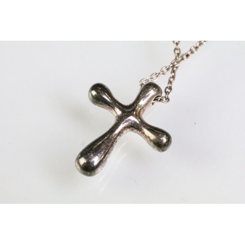 68 - Group of Tiffany & Co silver jewellery to include a modernist silver cross pendant, crucifix pendant... 