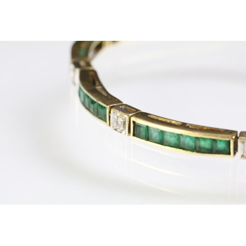 80 - 18ct gold emerald and diamond line bracelet. The bracelet having square step cut emerald panels set ... 