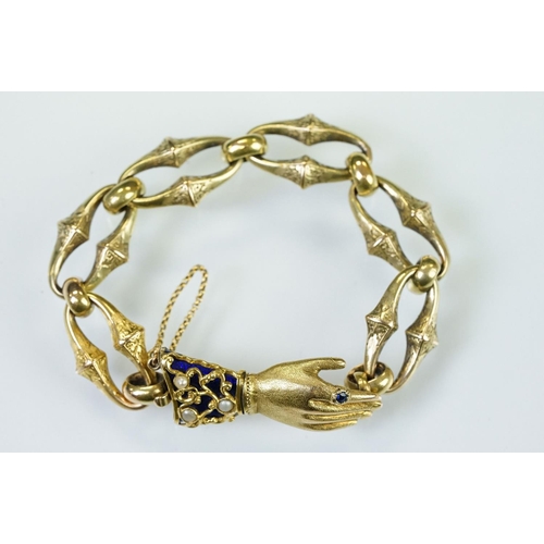 1 - 19th Century Victorian gold bracelet having a hand modelled clasp. The clasp having a blue enamelled... 