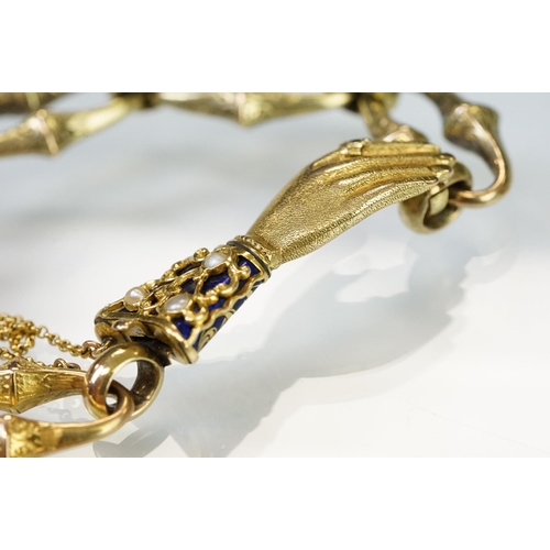 1 - 19th Century Victorian gold bracelet having a hand modelled clasp. The clasp having a blue enamelled... 