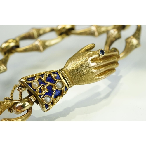 1 - 19th Century Victorian gold bracelet having a hand modelled clasp. The clasp having a blue enamelled... 