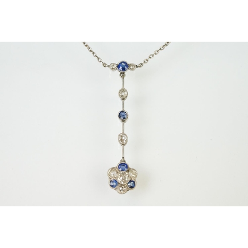 10 - Early 20th Century Edwardian sapphire and diamond pendant necklace. The necklace having a pendant dr... 